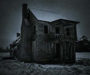 A Haunting Black and white photo of the Witch of Pungo's house before it burned down